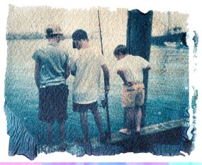 three boys fishing null